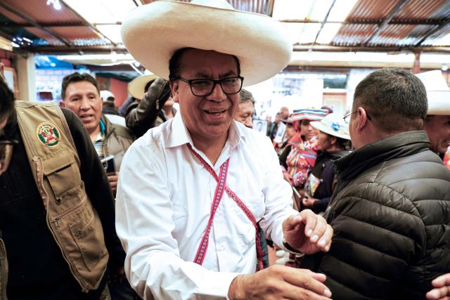Peru's presidential candidate for the Juntos por el Peru party, Roberto Sanchez, is seen during a meeting with the with the association of relatives of victims of the 2022-2023 protests against President Dina Boluarte, in Juliaca, Peru, on June 03, 2026. Peruvians will choose their president on June 7, 2026, between right-wing candidate Keiko Fujimori, heir to a political dynasty that divides the nation, and left-wing candidate Roberto Sáncheztwo diametrically opposed visions for a country plagued by instability and crime. (Photo by Juan Carlos CISNEROS / AFP)