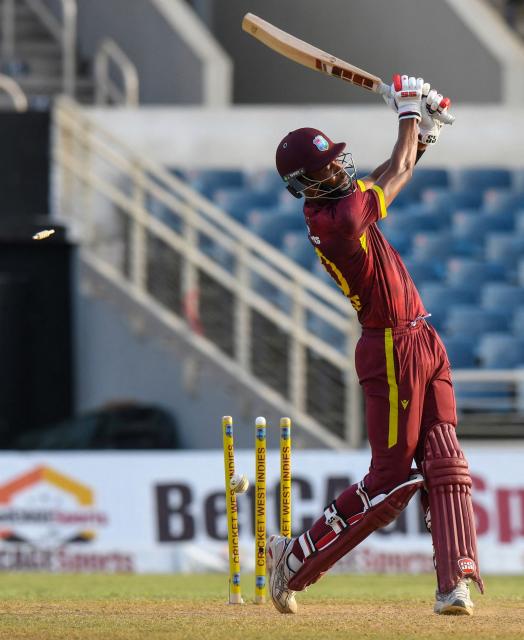 West Indies batsman Roston Chase is clean bowled by Sri Lanka's Dushmantha Chameera for 33 runs during the first One Day International (ODI) cricket match between West Indies and Sri Lanka at Sabina Park in Kingston, Jamaica, on June 3, 2026. (Photo by Randy Brooks / AFP)