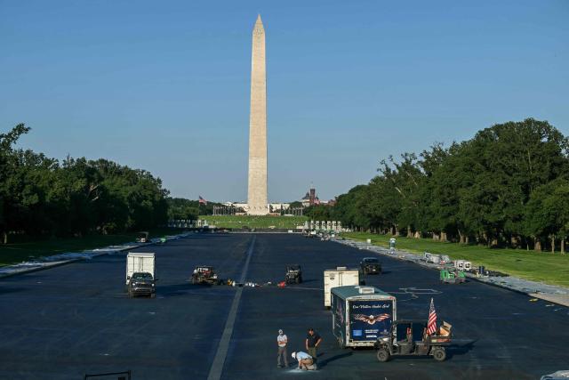 Contractors work on the Reflecting Pool at the National Mall in Washington, DC, on June 3, 2026. (Photo by Brendan SMIALOWSKI / AFP)