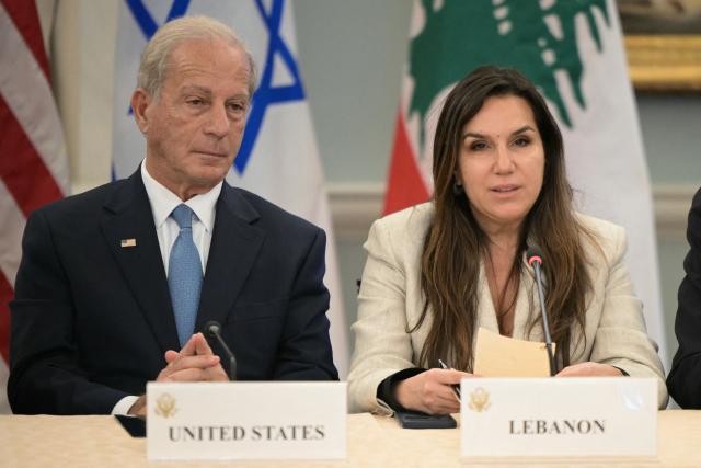 US Ambassador to Lebanon Michel Issa listens as Lebanese Ambassador to the US Nada Hamadeh (R) speaks during a meeting between Israeli and Lebanese delegations hosted by the United States at the State Department in Washington, DC, on June 3, 2026. Israel and Lebanon agreed Wednesday to implement a ceasefire but said it would require a "complete cessation" of fire by Iran-backed Hezbollah, according to a joint statement after US-led talks in Washington. The two sides, which do not have formal diplomatic relations, also agreed to create "pilot zones" in which the Lebanese armed forces "will take exclusive control of the territory to the exclusion of all non-state actors." (Photo by Oliver Contreras / AFP)