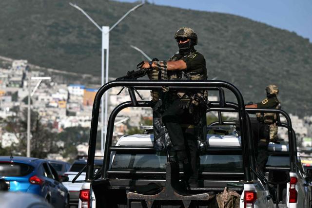 Mexican soldiers patrol on a street in Pachuca, Mexico on June 3, 2026, ahead of the FIFA 2026 World Cup football tournament. (Photo by YURI CORTEZ / AFP)