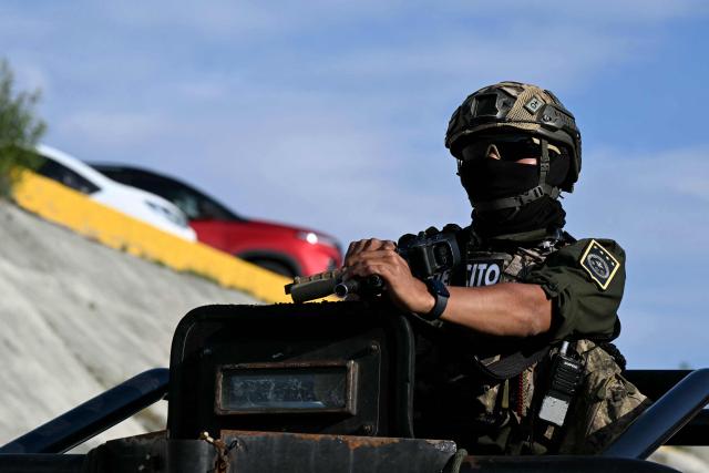 A Mexican soldier patrols on a street in Pachuca, Mexico on June 3, 2026, ahead of the FIFA 2026 World Cup football tournament. (Photo by YURI CORTEZ / AFP)