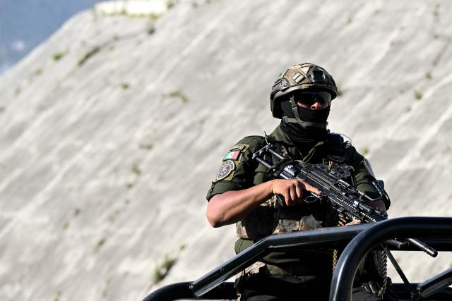 A Mexican soldier patrols on a street in Pachuca, Mexico on June 3, 2026, ahead of the FIFA 2026 World Cup football tournament. (Photo by YURI CORTEZ / AFP)