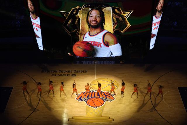 New York Knicks point guard Jalen Brunson is seen on a screen as cheer leaders perform ahead of Game 1 of the NBA Finals between the New York Knicks and the San Antonio Spurs at Madison Square Garden in New York City on June 3, 2026. (Photo by TIMOTHY A. CLARY / AFP)
