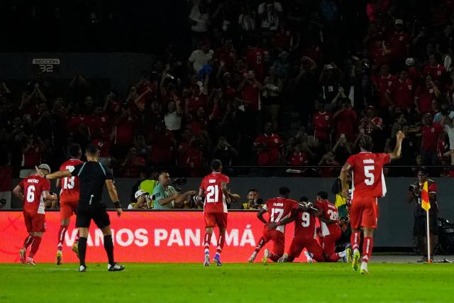 Panama's forward #09 Tomas Rodriguez celebrates with teammates after scoring his team's first goal during the international friendly football match between Panama and Dominican Republic at the Rommel Fernandez Gutierrez Stadium in Panama City on June 3, 2026. (Photo by ARNULFO FRANCO / AFP)