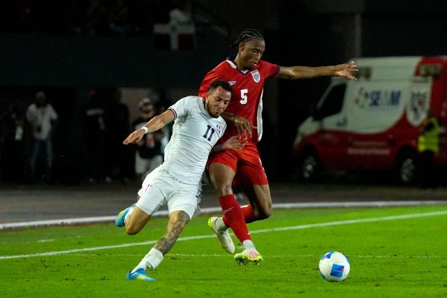 Dominican Republic's defender #11 Edarlyn Reyes and Panama's defender #05 Edgardo Farina fight for the ball during the international friendly football match between Panama and Dominican Republic at the Rommel Fernandez Gutierrez Stadium in Panama City on June 3, 2026. (Photo by ARNULFO FRANCO / AFP)