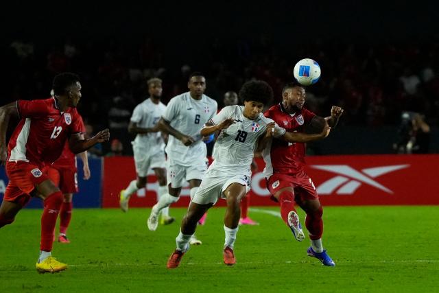 Dominican Republic's forward #19 Peter Federico and Panama's midfielder #28 Victor Griffith fight for the ball during the international friendly football match between Panama and Dominican Republic at the Rommel Fernandez Gutierrez Stadium in Panama City on June 3, 2026. (Photo by ARNULFO FRANCO / AFP)