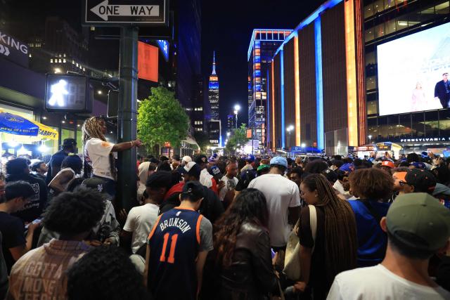 Basketball fans gather outside Madison Square Garden during Game 1 of the NBA Finals between the New York Knicks and the San Antonio Spurs, in New York City, on June 3, 2026. (Photo by TIMOTHY A.CLARY / AFP)