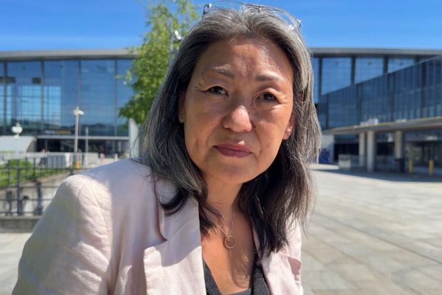 A picture shows adopted Sofie Randel on May 9, 2026 in Kastrup near Copenhagen, Denmark. Eight South Korean adoptees are suing Denmark for its role in their illegal adoptions, demanding the state admit responsibility for violating their right to their identity, origins and family. (Photo by Camille BAS-WOHLERT / AFP)