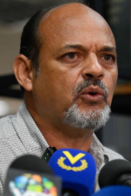 Gabriel Quero Navas, brother of late Venezuelan political prisoner Victor Quero Navas, speaks during a press conference in Caracas on June 3, 2026. The brother of Victor Quero, a political prisoner whose death while in state custody in Venezuela was reported nine months after it occurred, denounced the authorities' handling of the case as a "clear and flagrant" lack of respect, he said during a press conference on June 3, 2026. (Photo by Maryorin Mendez / AFP)