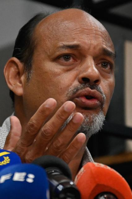 Gabriel Quero Navas, brother of late Venezuelan political prisoner Victor Quero Navas, speaks during a press conference in Caracas on June 3, 2026. The brother of Victor Quero, a political prisoner whose death while in state custody in Venezuela was reported nine months after it occurred, denounced the authorities' handling of the case as a "clear and flagrant" lack of respect, he said during a press conference on June 3, 2026. (Photo by Maryorin Mendez / AFP)
