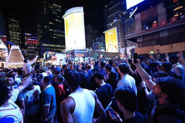 Knicks fans celebrate in New York City after the New York Knicks defeated the San Antonio Spurs in Game 1 of the NBA Finals, on June 3, 2026. (Photo by TIMOTHY A.CLARY / AFP)