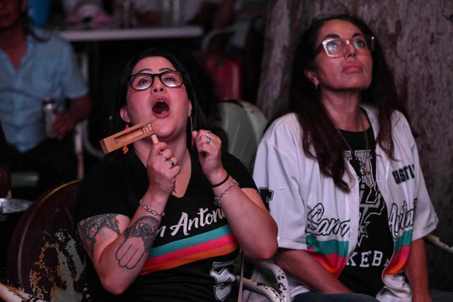 San Antonio Spurs fans watch and react to Game 1 of the NBA Finals between the San Antonio Spurs and New York Knicks in San Antonio, Texas, on June 3, 2026. (Photo by RONALDO SCHEMIDT / AFP)