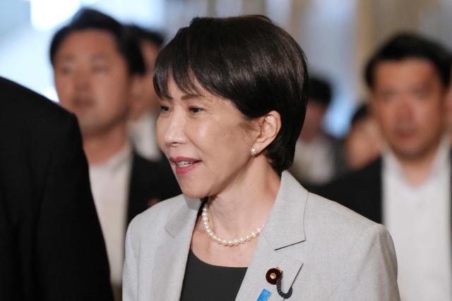Japan's Prime Minister Sanae Takaichi arrives at the National Diet to attend a House of Representatives budget committee session in Tokyo on June 4, 2026. (Photo by Kazuhiro NOGI / AFP)