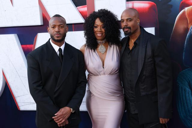 (L-R) US actor/producer/writer Marlon Wayans, US actress Kim Wayans and US actor/producer/writer Shawn Wayans attend Paramount's "Scary Movie" premiere at the Paramount theatre in Los Angeles, on June 3, 2026. (Photo by VALERIE MACON / AFP)