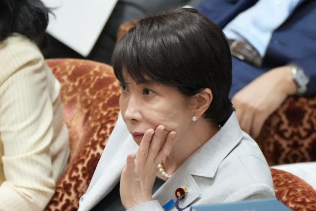 Japan's Prime Minister Sanae Takaichi listens to a question during a House of Representatives budget committee session at the National Diet in Tokyo on June 4, 2026. (Photo by Kazuhiro NOGI / AFP)