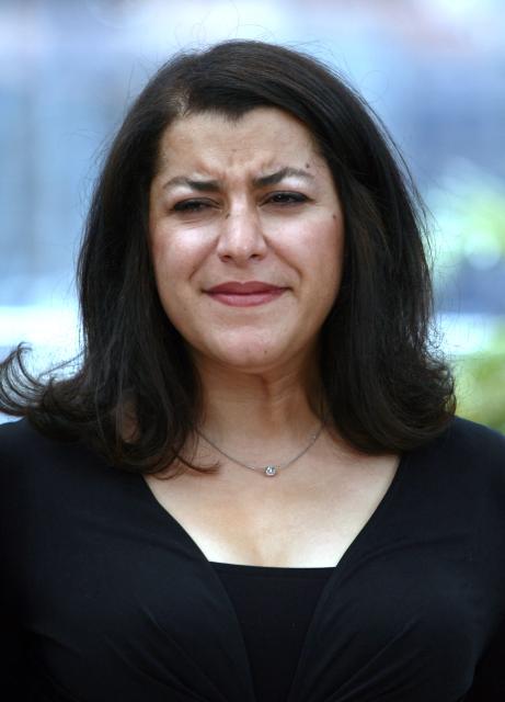 (FILES) Iranian cartoonist Marjane Satrapi poses 22 May 2007 during a photocall for her animated film 'Persepolis' in the Festival Palace in Cannes, southern France, at the 60th edition of the Cannes Film Festival. The film is in competition for the Palme d'Or film prize. The Franco-Iranian artist Marjane Satrapi, who gained worldwide recognition with the graphic novel and film "Persepolis," has died at the age of 56, AFP learned on June 4, 2026 from her relatives. (Photo by Fred DUFOUR / AFP)