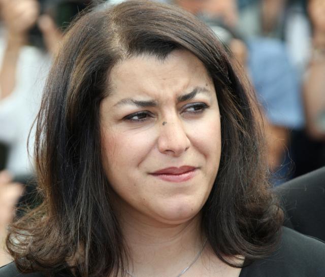 (FILES) Iranian cartoonist Marjane Satrapi pose 22 May 2007 during a photocall for her animated film 'Persepolis' in the Festival Palace in Cannes, southern France, at the 60th edition of the Cannes Film Festival. The film is in competition for the Palme d'Or film prize. The Franco-Iranian artist Marjane Satrapi, who gained worldwide recognition with the graphic novel and film "Persepolis," has died at the age of 56, AFP learned on June 4, 2026 from her relatives. (Photo by ANNE-CHRISTINE POUJOULAT / AFP)