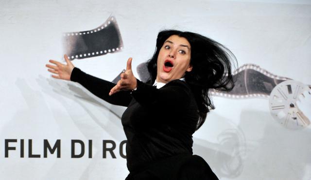 (FILES) Iranian writer and film director Marjane Satrapi gestures as she poses during the photocall of her latest film "La bande des Jotas" (Gang of the Jotas) in Rome, on November 16, 2012 during the seventh edition of the Rome film festival. The Franco-Iranian artist Marjane Satrapi, who gained worldwide recognition with the graphic novel and film "Persepolis," has died at the age of 56, AFP learned on June 4, 2026 from her relatives. (Photo by TIZIANA FABI / AFP)
