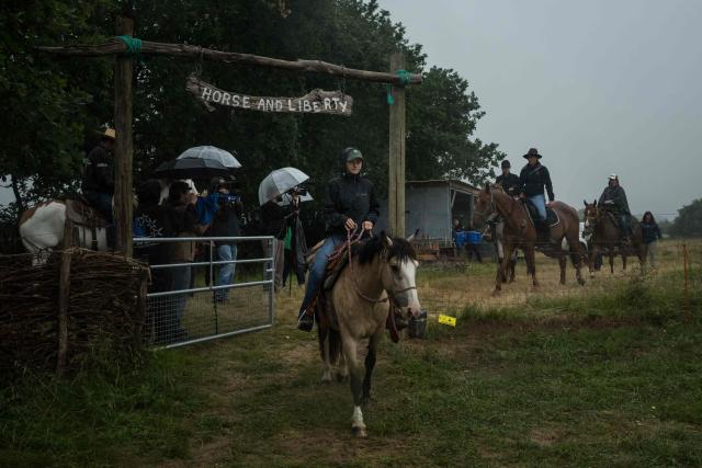 Searchers on horseback depart to continue the search for missing 11-year-old girl Lyhanna who went missing on May 29 after getting into a man's car in front of her middle school in the town of Fleurance, west of Toulouse, on June 4, 2026. A 41 year-old suspect, father of one of Lyhanna's friends, who, prior to her disappearance, had been the subject of several reports and complaints, notably for the rape of a minor, was formally charged on June 1 with kidnapping and false imprisonment, and placed in custody. (Photo by Ed JONES / AFP)