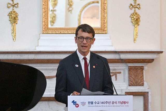 French Ambassador to South Korea Philippe Bertoux delivers a speech during a ceremony celebrating the 140th anniversary of Korea-France diplomatic relations at Seokjojeon Hall of Deoksugung Palace in Seoul on June 4, 2026. (Photo by Jung Yeon-je / AFP)