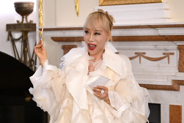South Korean soprano Jo Sumi performs during a ceremony celebrating the 140th anniversary of Korea-France diplomatic relations at Seokjojeon Hall of Deoksugung Palace in Seoul on June 4, 2026. (Photo by Jung Yeon-je / AFP)