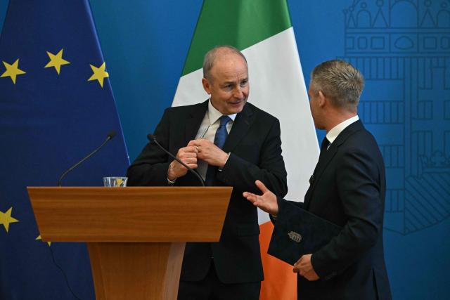 Hungary’s Prime Minister Peter Magyar (R) and Ireland's Prime Minister Micheal Martin chat at the end of a press conference at the foreign ministry in Budapest, Hungary, on June 4, 2026. Ireland will take over the rotating presidency of the Council of the EU from 1 July 2026. The bilateral talks are focused on the currently withheld funds due to Hungary and other current European issues. (Photo by ATTILA KISBENEDEK / AFP)