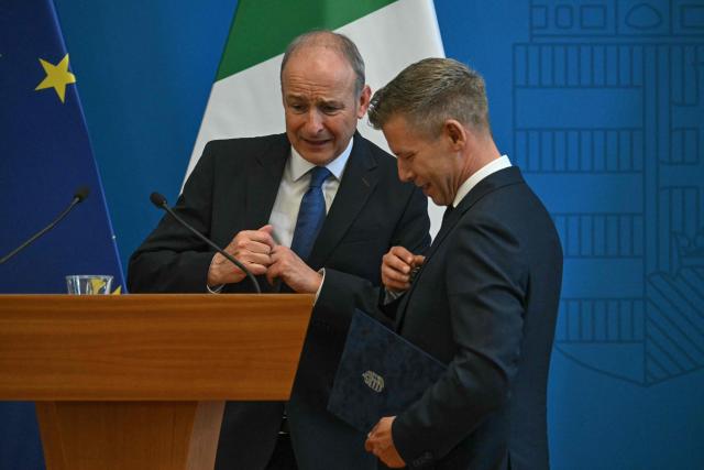 Hungary’s Prime Minister Peter Magyar (R) and Ireland's Prime Minister Micheal Martin chat at the end of a press conference at the foreign ministry in Budapest, Hungary, on June 4, 2026. Ireland will take over the rotating presidency of the Council of the EU from 1 July 2026. The bilateral talks are focused on the currently withheld funds due to Hungary and other current European issues. (Photo by ATTILA KISBENEDEK / AFP)