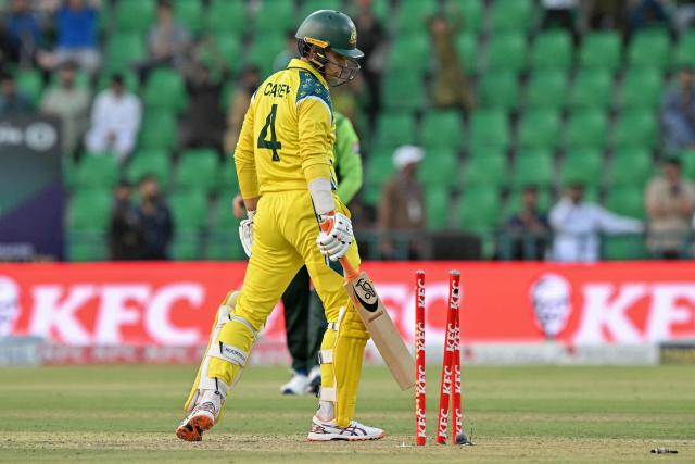 Australia's Alex Carey reacts after getting clean bowled by Pakistan's Haris Rauf during the third one-day international (ODI) cricket match between Australia and Pakistan at Gaddafi Stadium in Lahore on June 4, 2026. (Photo by ARIF ALI / AFP)