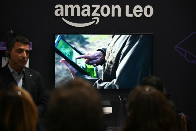 Members of the media are shown a demonstration of Amazon Leo, Amazon's low Earth orbit satellite network, on the second day of 'Delivering the Future EMEA ‘26', at Amazon’s LCY3 Fulfillment Centre in Dartford, east of London, on June 4, 2026. (Photo by JUSTIN TALLIS / AFP)