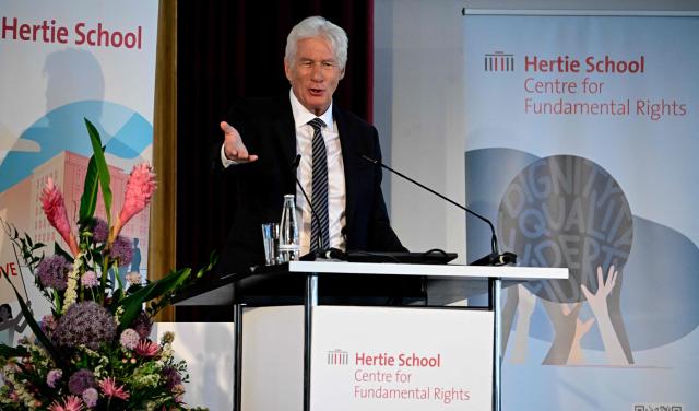US actor, founder and Co-Chair of the Gere Foundation Richard Gere gives a speech at the Hertie School Centre for Fundamental Rights at a joint launch of an Initiative on Migration in Berlin on June 4, 2026. (Photo by Tobias SCHWARZ / AFP)
