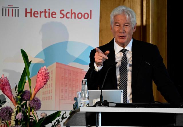 US actor, founder and Co-Chair of the Gere Foundation Richard Gere gives a speech at the Hertie School Centre for Fundamental Rights at a joint launch of an Initiative on Migration in Berlin on June 4, 2026. (Photo by Tobias SCHWARZ / AFP)