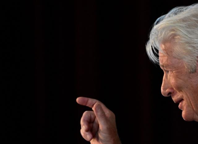 US actor, Founder and Co-Chair of the Gere Foundation Richard Gere delivers a speech at the Hertie School Centre for Fundamental Rights on a joint launch of an Initiative on Migration in Berlin on June 4, 2026. (Photo by Tobias SCHWARZ / AFP)