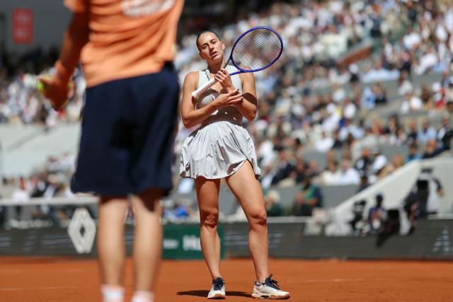 Ukraine's Marta Kostyuk reacts as she plays against Mirra Andreeva during their women's semi final singles match on day 12 of the French Open tennis tournament on Court Philippe-Chatrier at the Roland-Garros Complex in Paris on June 4, 2026. (Photo by Thomas SAMSON / AFP)