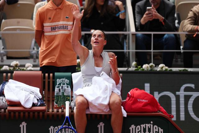 Ukraine's Marta Kostyuk reacts during a break in play in her women's semi final singles match against on day 12 of the French Open tennis tournament on Court Philippe-Chatrier at the Roland-Garros Complex in Paris on June 4, 2026. (Photo by Dimitar DILKOFF / AFP)