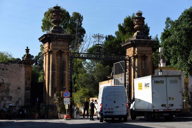 Vans wait to enter Villa Valguarnera, one of the venues hosting the three-day wedding celebrations of British singer Dua Lipa and British actor Callum Turner in Bagheria, near Palermo, Sicily, on June 4, 2026. The couple, who married in a civil ceremony in London on May 31, are set to celebrate with guests from June 5 to 7 across several Palermo venues, with the main event to be held at Villa Valguarnera in nearby Bagheria. (Photo by ALESSANDRO FUCARINI / AFP)