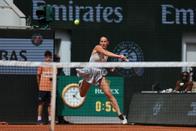 Ukraine's Marta Kostyuk plays a forehand return to Mirra Andreeva during their women's semi final singles match on day 12 of the French Open tennis tournament on Court Philippe-Chatrier at the Roland-Garros Complex in Paris on June 4, 2026. (Photo by Thomas SAMSON / AFP)
