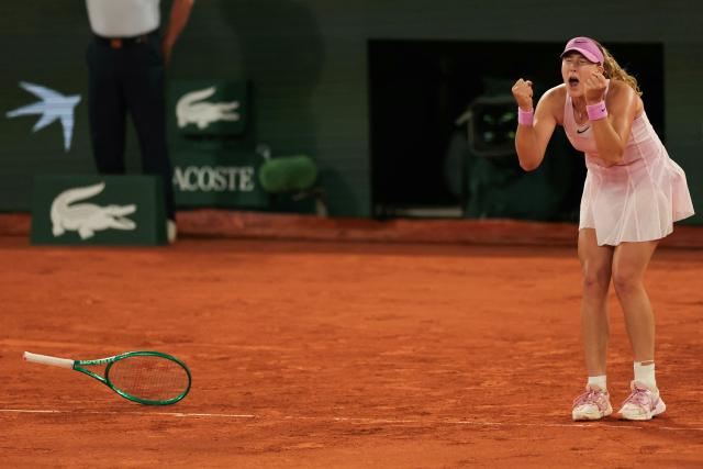 Mirra Andreeva celebrates after winning against Ukraine's Marta Kostyuk at the end of their women's semi final singles match on day 12 of the French Open tennis tournament on Court Philippe-Chatrier at the Roland-Garros Complex in Paris on June 4, 2026. (Photo by Thomas SAMSON / AFP)