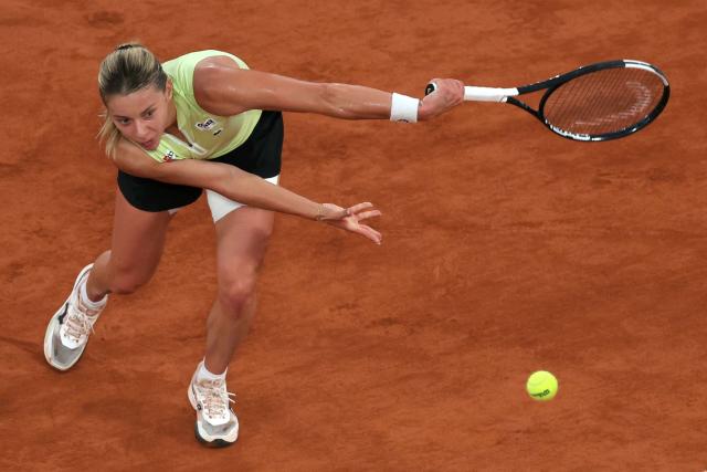 Poland's Maja Chwalinska plays a backhand return to Russia's Diana Shnaider during their women's semi final singles match on day 12 of the French Open tennis tournament on Court Philippe-Chatrier at the Roland-Garros Complex in Paris on June 4, 2026. (Photo by Thomas SAMSON / AFP)