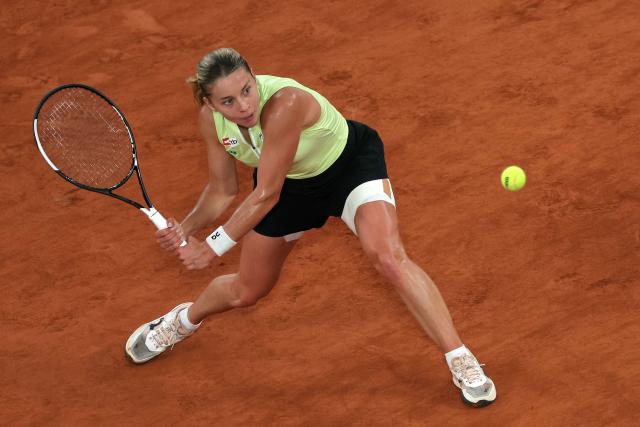 Poland's Maja Chwalinska plays a backhand return to Russia's Diana Shnaider during their women's semi final singles match on day 12 of the French Open tennis tournament on Court Philippe-Chatrier at the Roland-Garros Complex in Paris on June 4, 2026. (Photo by Thomas SAMSON / AFP)