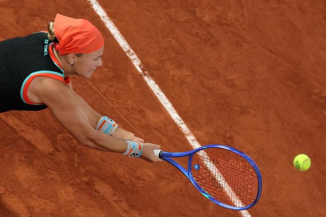 Russia's Diana Shnaider plays a backhand return to Poland's Maja Chwalinska during their women's semi final singles match on day 12 of the French Open tennis tournament on Court Philippe-Chatrier at the Roland-Garros Complex in Paris on June 4, 2026. (Photo by Thomas SAMSON / AFP)