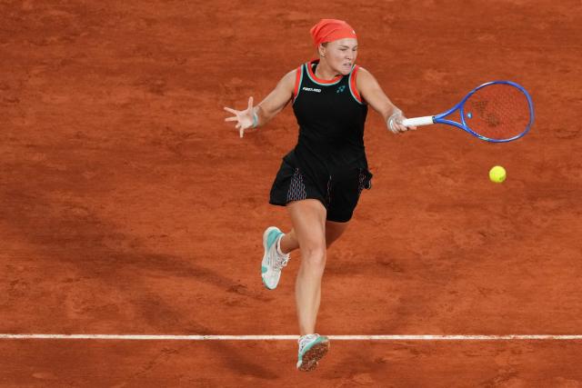 Russia's Diana Shnaider plays a forehand return to Poland's Maja Chwalinska during their women's semi final singles match on day 12 of the French Open tennis tournament on Court Philippe-Chatrier at the Roland-Garros Complex in Paris on June 4, 2026. (Photo by Dimitar DILKOFF / AFP)