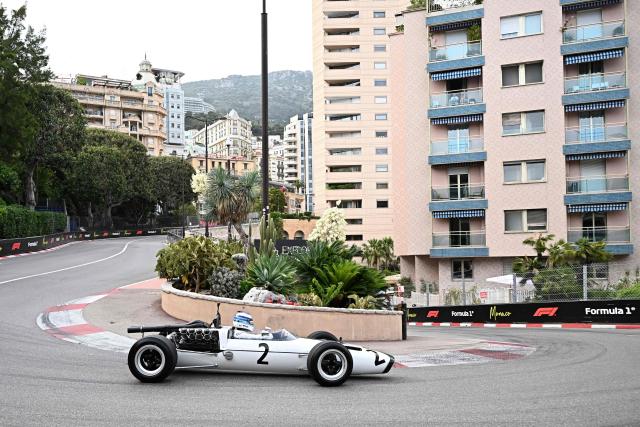 F1 McLaren legend Mika Hakkinen drives an old Formula 1 car as McLaren is celebrating  their 1000th F1 race this weekend  at the Circuit de Monaco ahead of the Formula One Monaco Grand Prix in Monaco on June 4, 2026. (Photo by Gabriel BOUYS / AFP)
