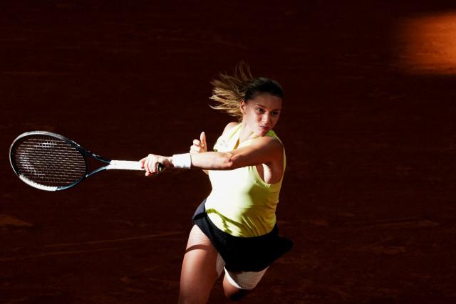Poland's Maja Chwalinska plays a forehand return to Russia's Diana Shnaider during their women's semi final singles match on day 12 of the French Open tennis tournament on Court Philippe-Chatrier at the Roland-Garros Complex in Paris on June 4, 2026. (Photo by Dimitar DILKOFF / AFP)