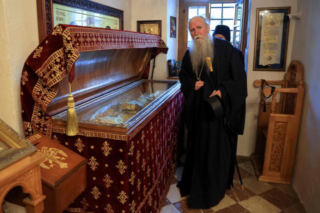 Bishop of Montenegro Joanikije Mi?ovi? stands before relics during a visit of France's President to the Cetinje Monastery during his first official visit to Montenegro ahead of the EU-Western Balkans Summit in Cetinje on June 4, 2026. Founded in 1484, the monastery is one of Montenegro's most significant spiritual and cultural sites and serves as a major center of Serbian Orthodox Christianity in the country. (Photo by Ludovic MARIN / AFP)