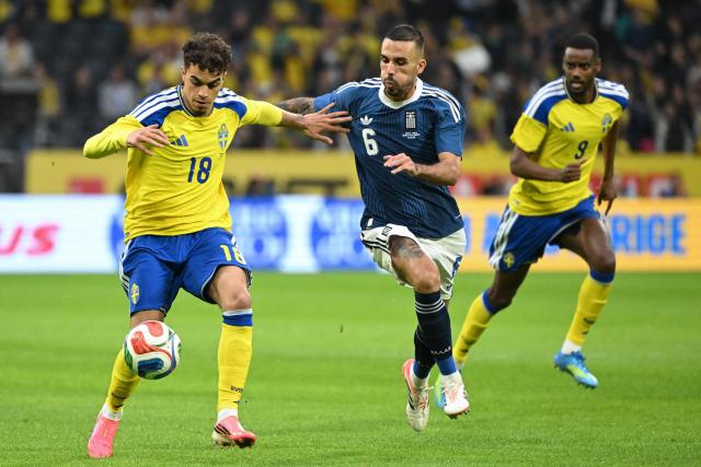 Greece's midfielder #06 Dimitrios Kourbelis (C) vies for the ball with Sweden's midfielder #18 Yasin Abbas Ayari (L) and Sweden's forward #09 Alexander Isak during the friendly match between Sweden and Greece ahead of the 2026 FIFA World Cup football tournament, in Solna, near Stockholm, on June 4, 2026. (Photo by Jonathan Nackstrand / AFP)