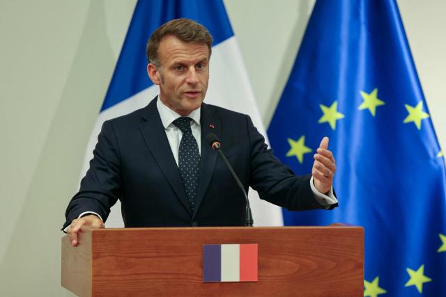 France's President Emmanuel Macron delivers a statement flanked by Montenegro's Prime Minister following a signing ceremony during Macron's first official visit to Montenegro in Cetinje on June 4, 2026. (Photo by Ludovic MARIN / AFP)