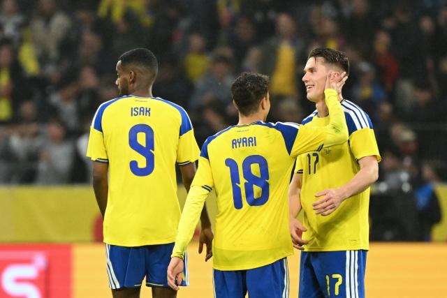 Sweden's forward #17 Viktor Gyokeres (R) celebrates scoring his team's first goal with teammates Sweden's midfielder #18 Yasin Abbas Ayari (C) and Sweden's forward #09 Alexander Isak during the friendly match between Sweden and Greece ahead of the 2026 FIFA World Cup football tournament, in Solna, near Stockholm, on June 4, 2026. (Photo by Jonathan Nackstrand / AFP)