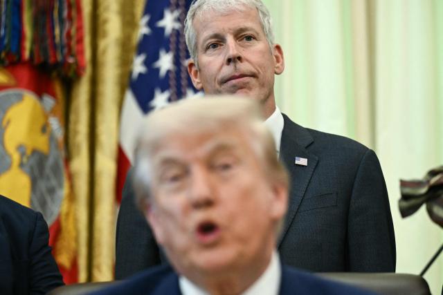 US Secretary of Energy Chris Wright looks on as President Donald Trump speaks during an announcement about coal, in the Oval Office of the White House in Washington, DC on June 4, 2026. (Photo by Brendan SMIALOWSKI / AFP)