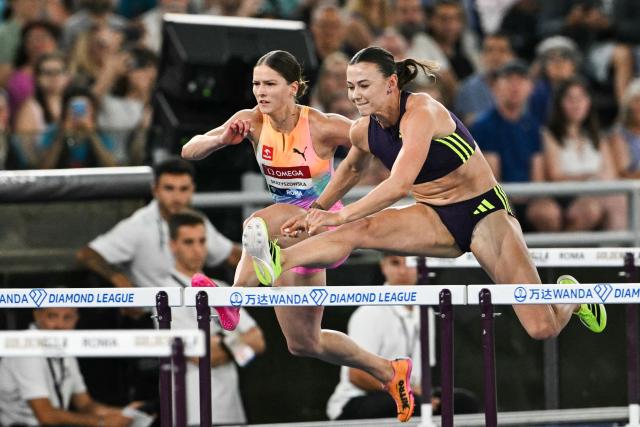 Third-placed Netherlands' Nadine Visser (front R) competes in the women's 100m Hurdles during the IAAF Diamond League athletics meeting, at the Olympic Stadium, in Rome on June 4, 2026. (Photo by Andreas SOLARO / AFP)
